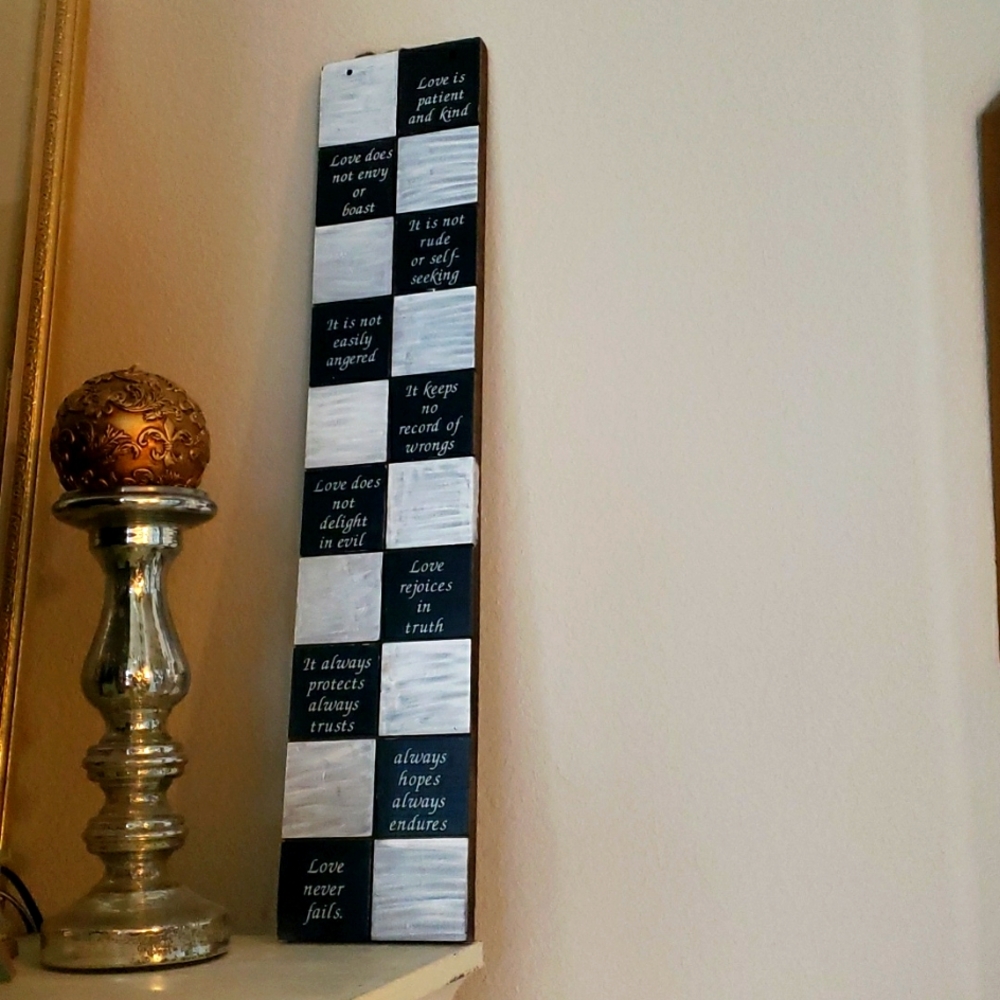 Love is wall decor made of wood 26 inches tall. Check video for measurements.